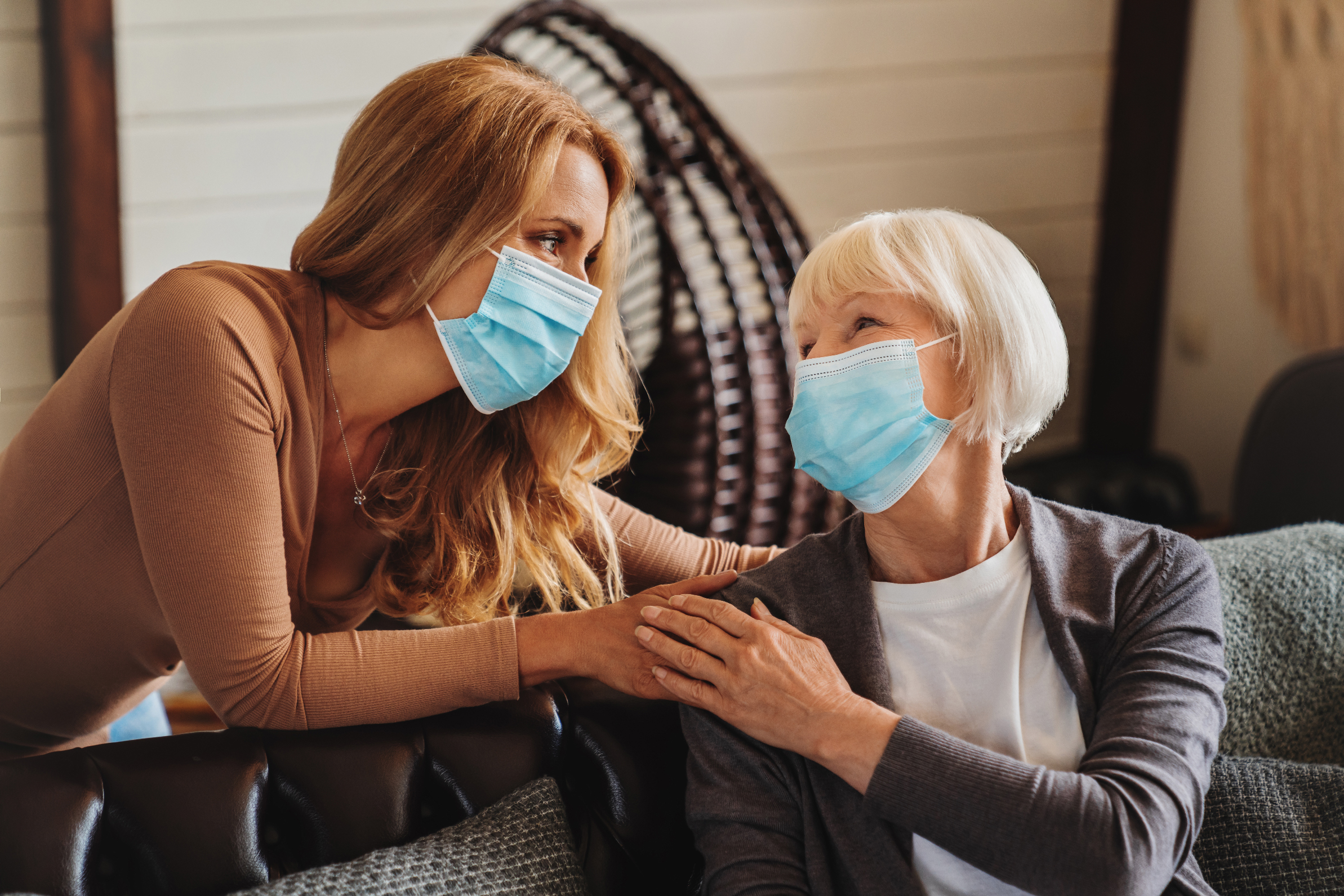 Stock photo of women wearing surgical masks