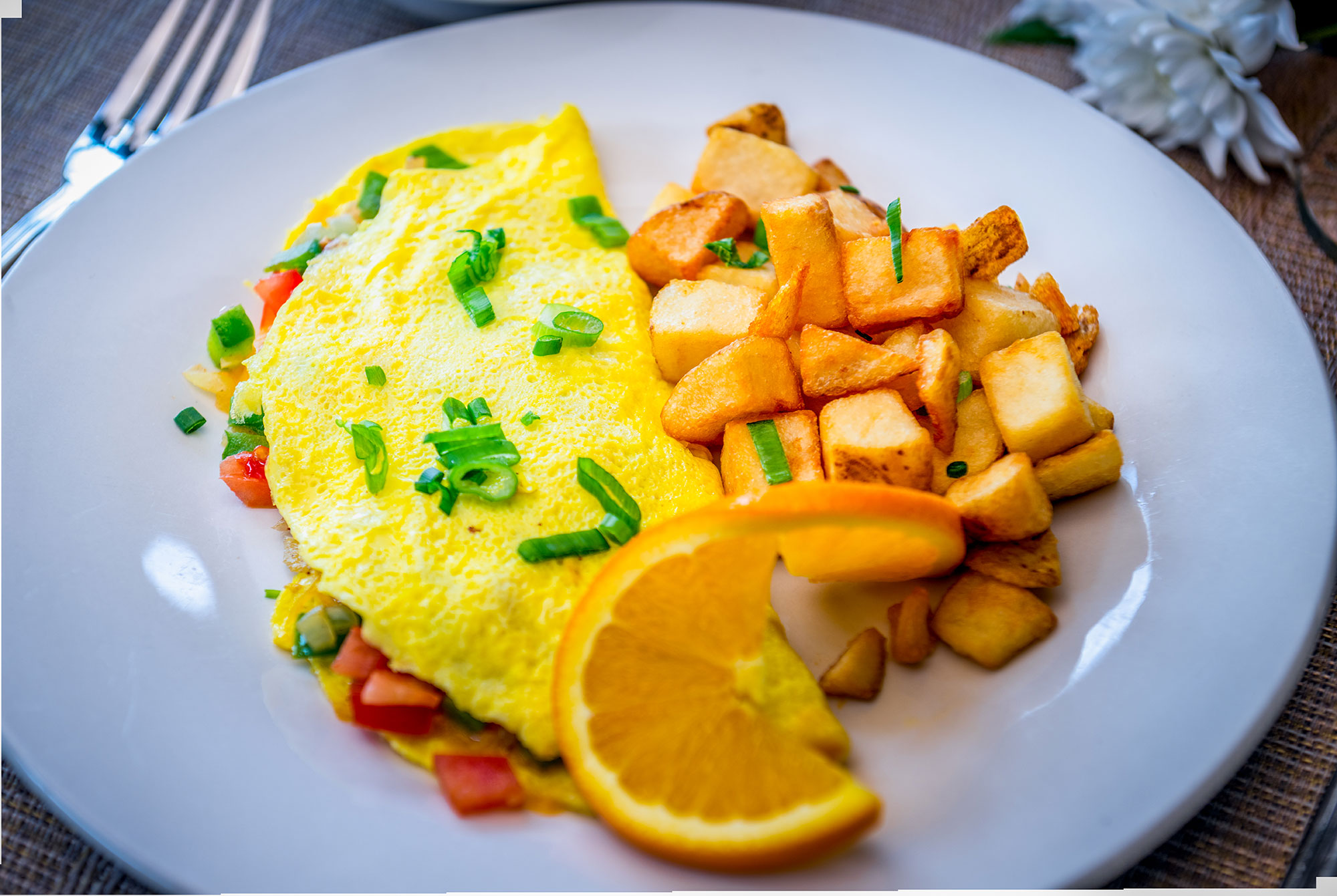 Omelet, potatoes Elevate Dining